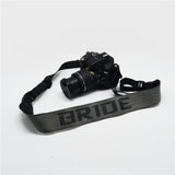 takata camera strap,jdm camera strap,bride camera strap,sparco camera strap,recaro camera strap,takata straps,bride camera bag,jdm store,jdm accessories,jdm strap,jdm lanyard,jdm camera,jdm parts,jdm merchandise,bride racing,bride racing straps,bride racing harness,bride racing seat